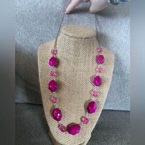 Pink beaded necklace with no clasp.